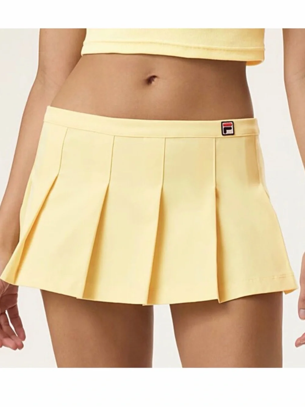 FILA x Hailey‎ Bieber Popcorn Yellow Pleated Mini Skirt Sz 10 Preppy Kawaii